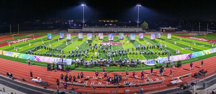 Marching+band+performs+on+football+field