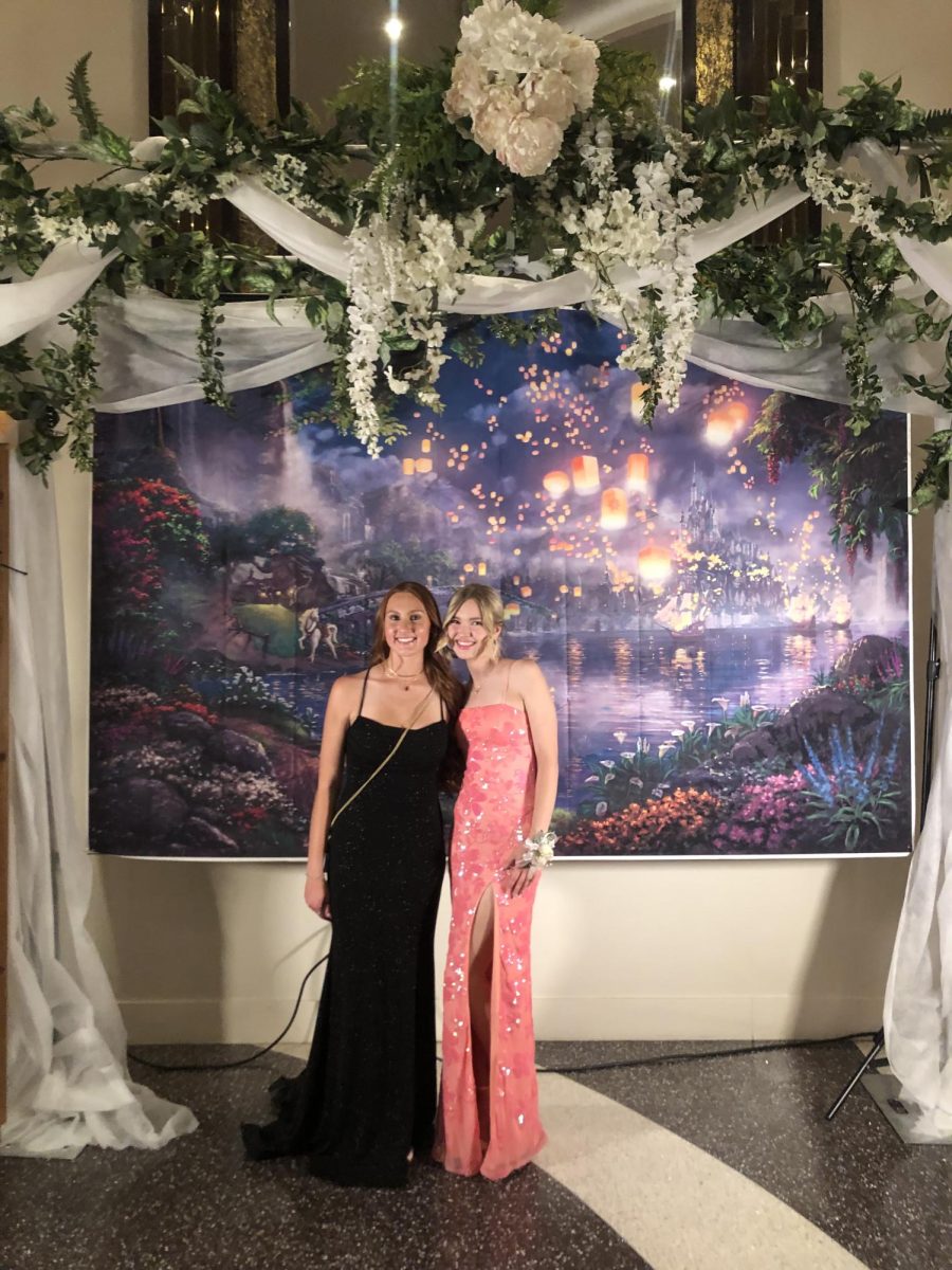 Two Ridge students pose at prom photo booth
