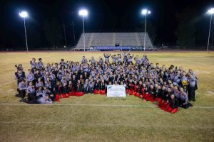 band members with their state championship award