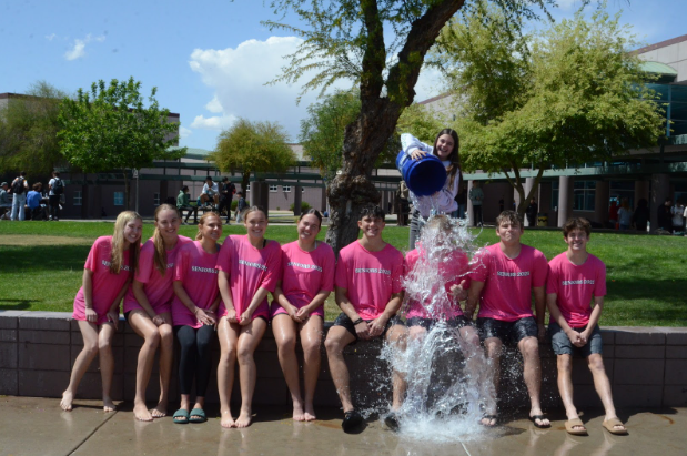 seniors pose for a photo after event