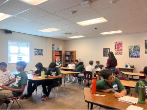 Freshman sit in classroom