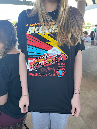 student wears cars t-shirt
