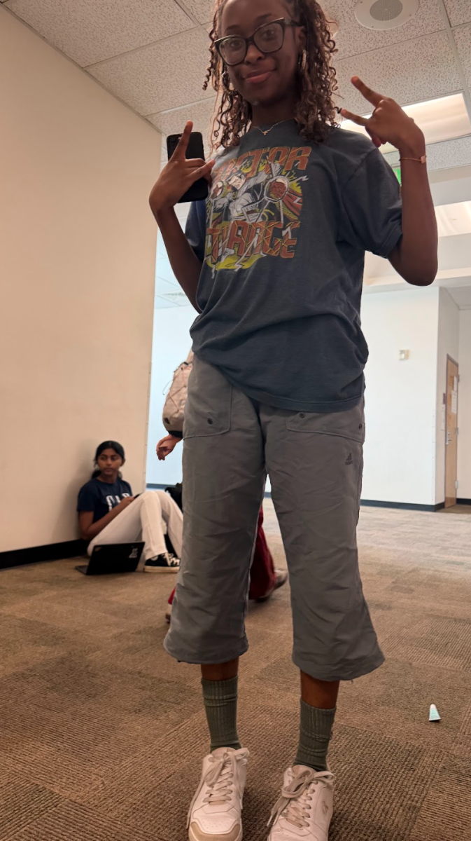 Student Emily Nkinzi wearing an Adam Sandler outfit