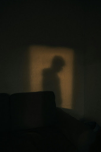 a person's shadow on a wall